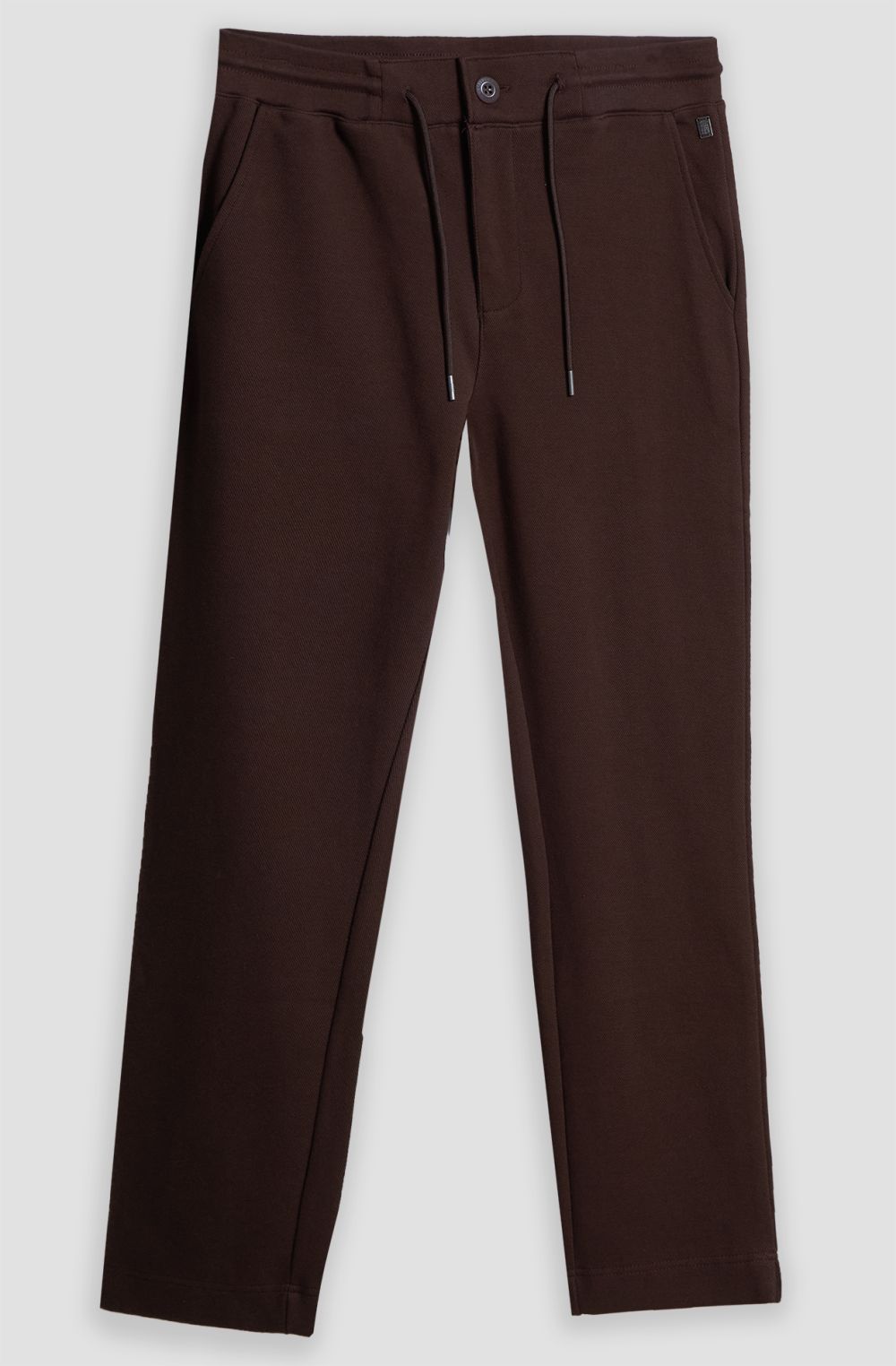 Jogger uomo in cotone felpato con zip e bottone