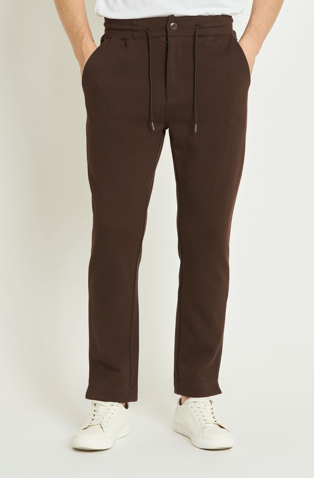 Jogger uomo in cotone felpato con zip e bottone