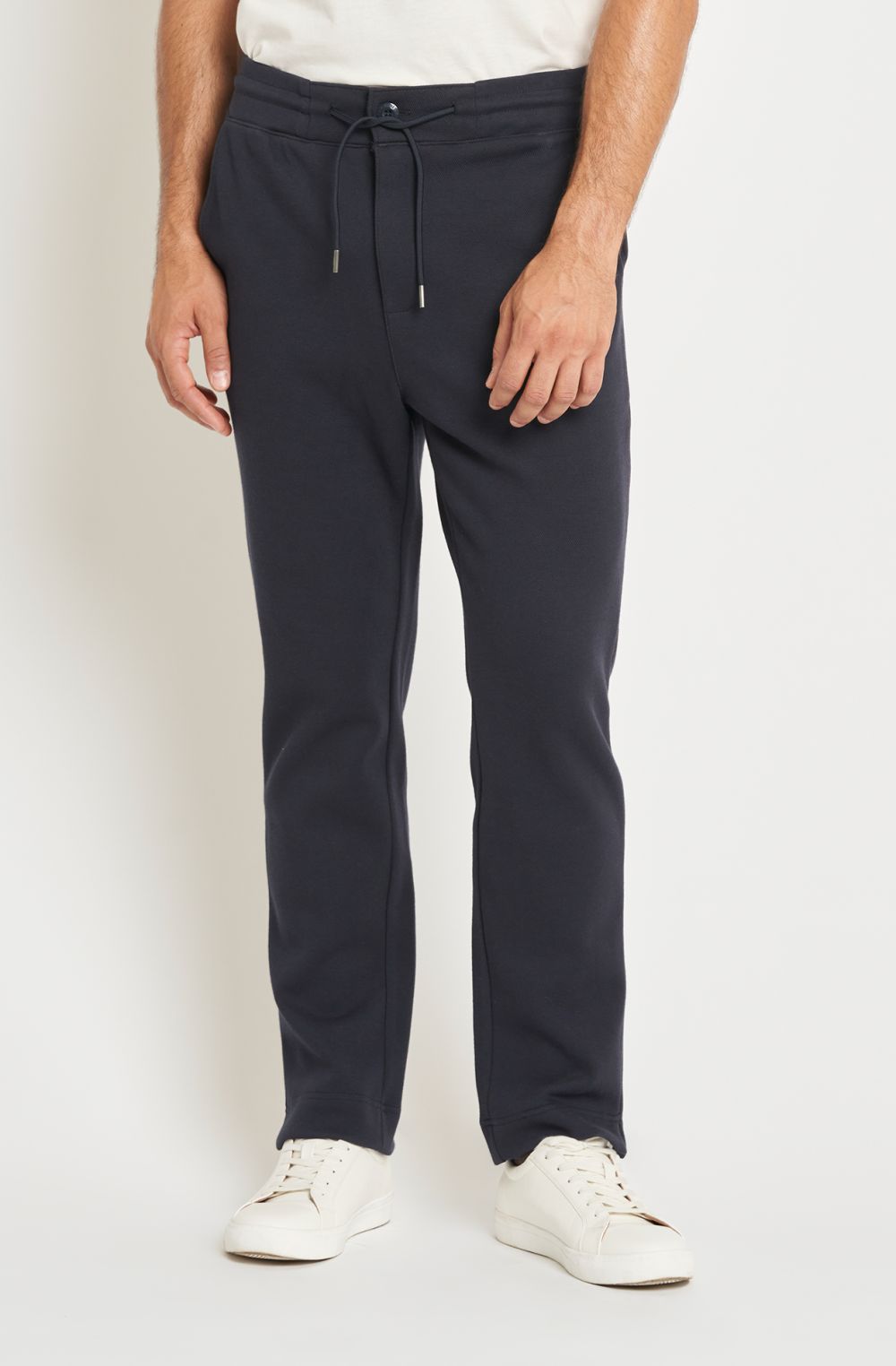 Jogger uomo in cotone felpato con zip e bottone